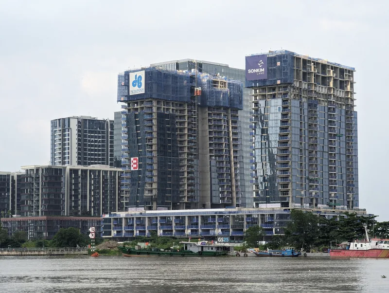 Skyscrapers under construction along the riverfront in the Thu Thiem urban area of Ho Chi Minh City.