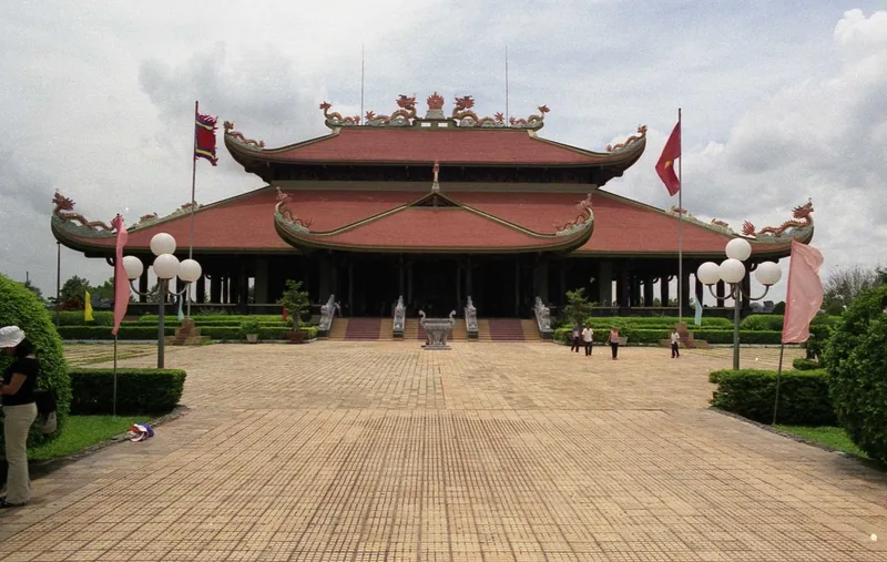 A red tiled roof with dragon motifs tops the Ben Duoc temple in Cu Chi, Tay Ninh.