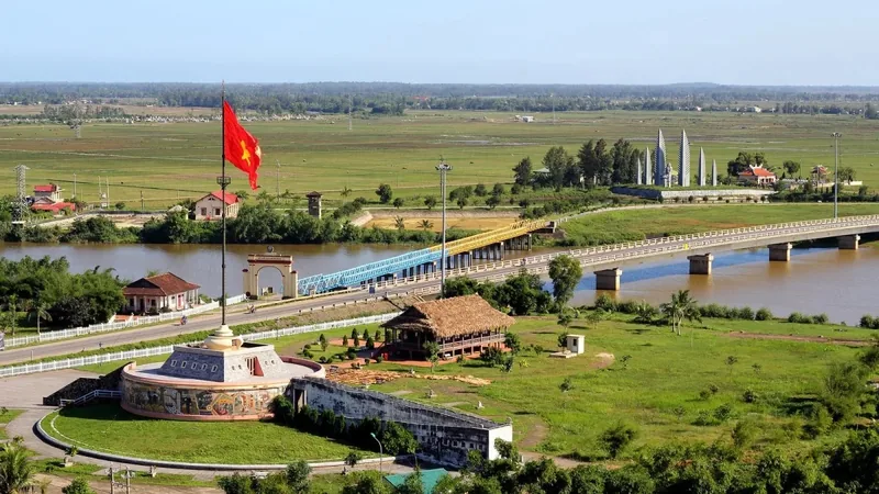 Aerial view of the Hien Luong Bridge and flag tower over the Ben Hai River at the historic DMZ near Hue.