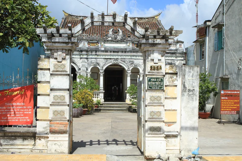 Ornate gated entrance to the historic Huynh Thuy Le ancestral house in Dong Thap, Vietnam.